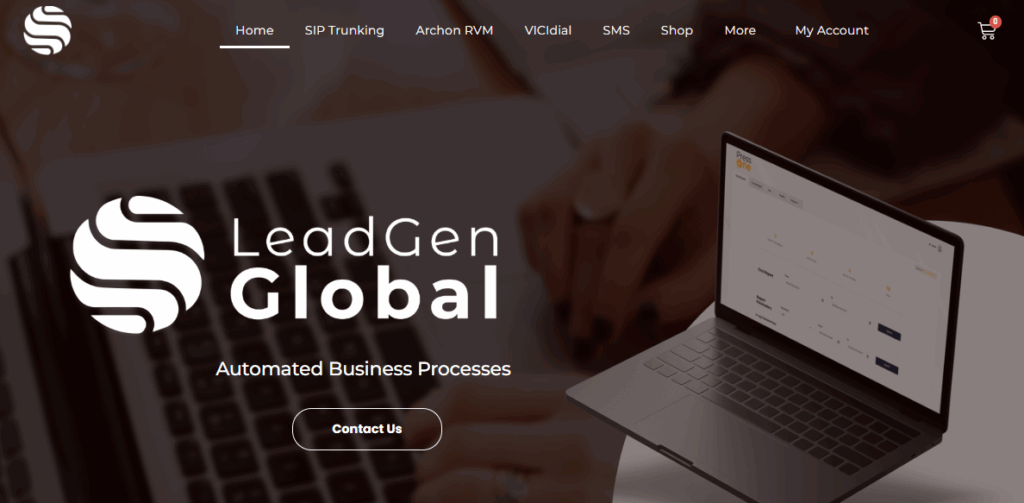 A laptop displaying a dashboard sits on a desk beside a person typing, featuring the LeadGen Global logo, navigation menu, Automated Business Processes text, and a Contact Us button-showcasing what users mention in LeadGG Reviews. VoiceDrop Ringless Voicemails
